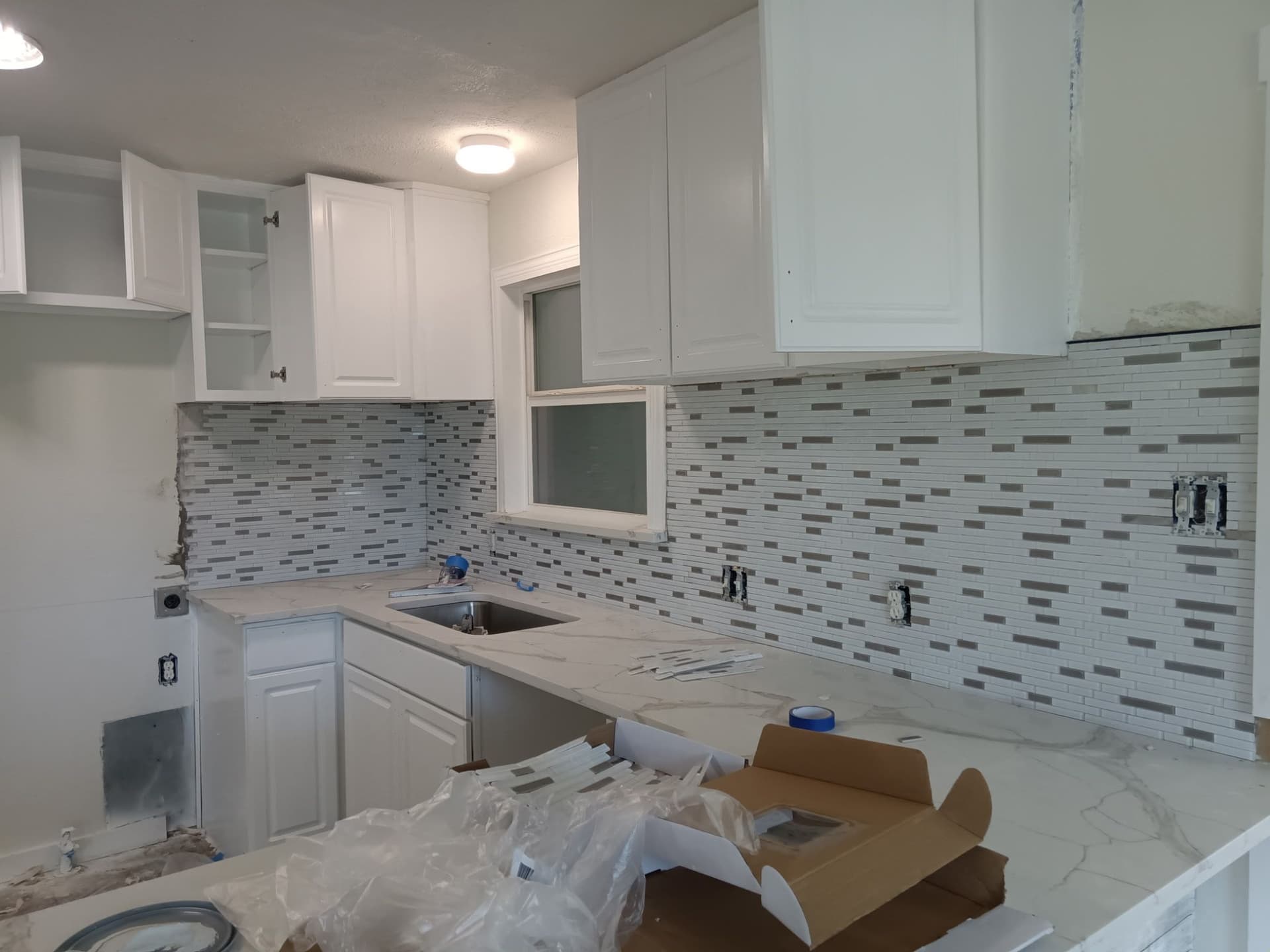 Sleek Kitchen and Elegant Bathroom Makeover image