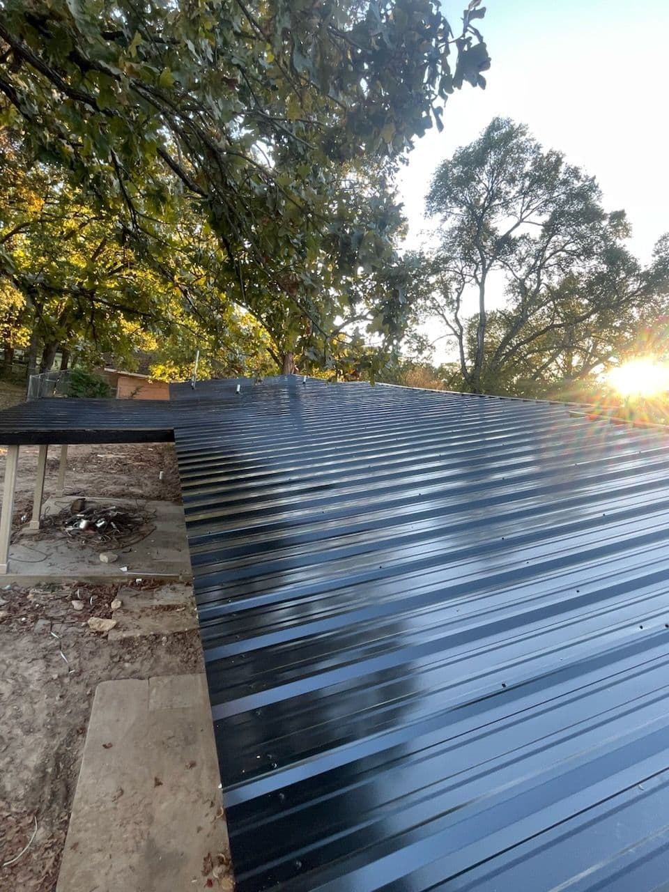 Sleek Black Metal Roof Installation